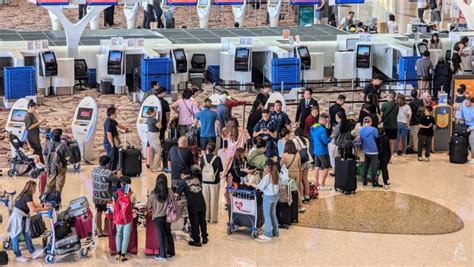 Long queues, frustrated passengers at Changi Airport after some .